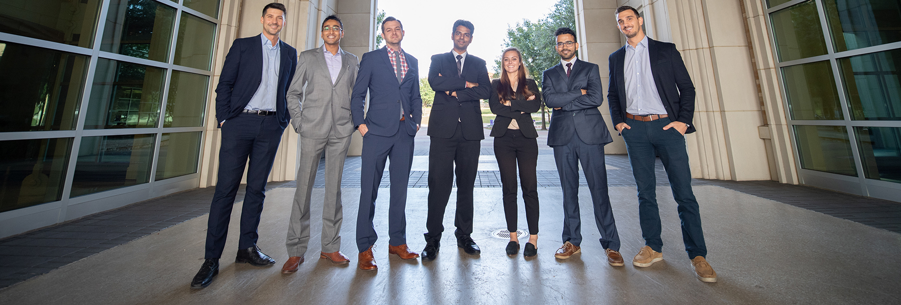 Section Image: MBA students in the BLUU arch 