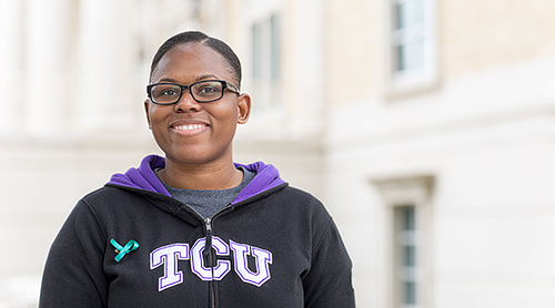 Section Image: diverse students at the TCU sign 