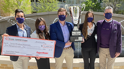 Section Image: Big 12 Case Competition winning team with check and trophy 