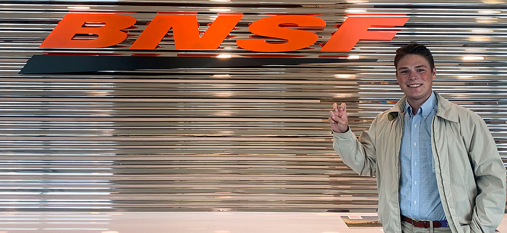 Section Image: Caleb Jerome with BNSF sign 