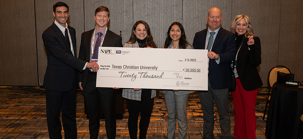 TCU NAPE Competition team with check