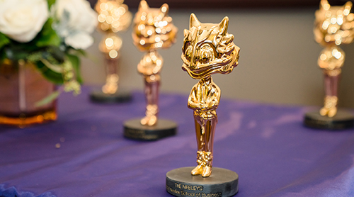 Section Image: Neeley Award statues of Superfrog 