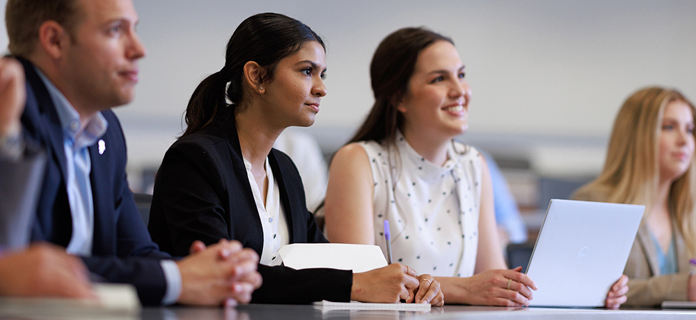 Section Image: Ariela Martinez speaks with students 