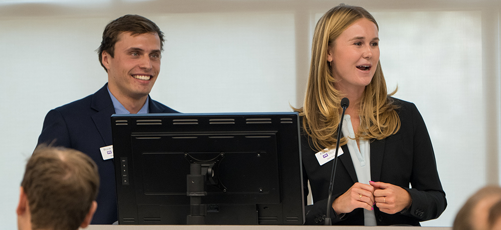 Section Image: Bryce Hopper and Kayla Mullin accepting the Learning Mantra Award 
