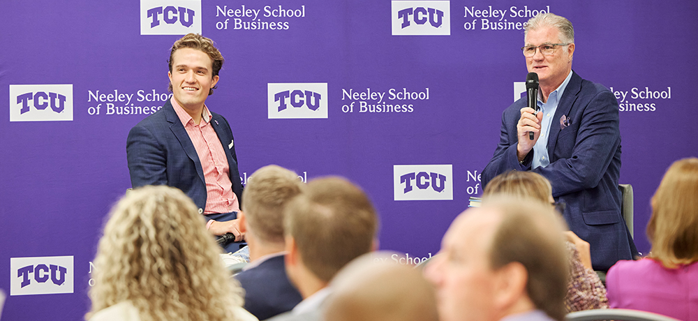 Section Image: Benji Backer and Michael Slattery on stage in the Hays Banquet Room during the Energy Summit 