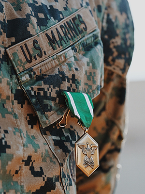 Close up of the award on his uniform under the words U.S. Marines