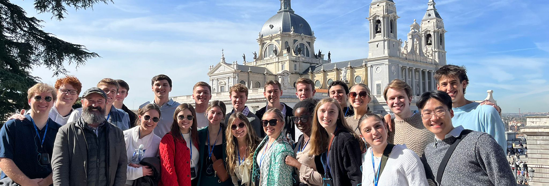 Section Image: Neeley Fellows Class of 2025 in front of a cathedral during study abroad. 