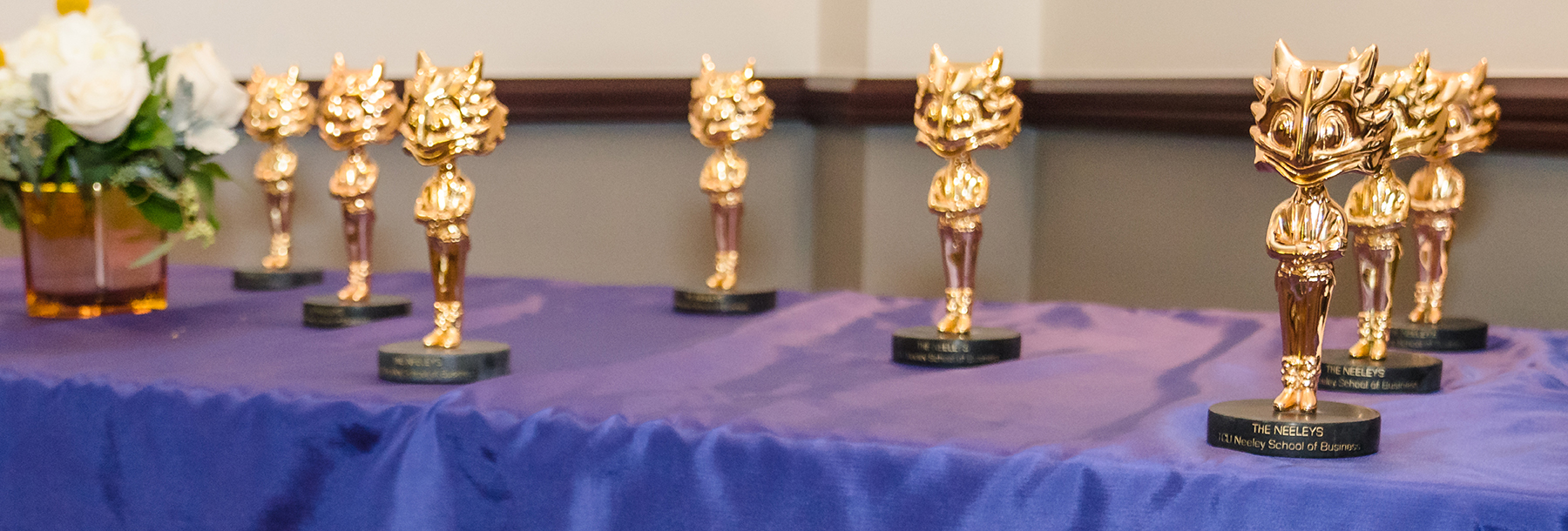 Section Image: Neeley Award trophies on a table 