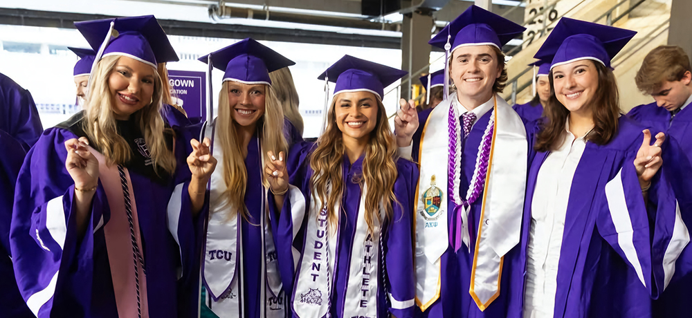 Graduates with their frogs up