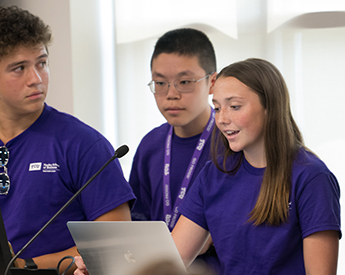 High school students participating in a TCU Neeley summer camp program