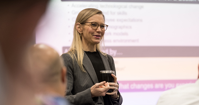 Female Executive Education professor addressing the class