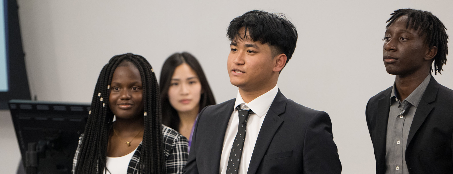High school students giving presentation during Business Innovation Academy