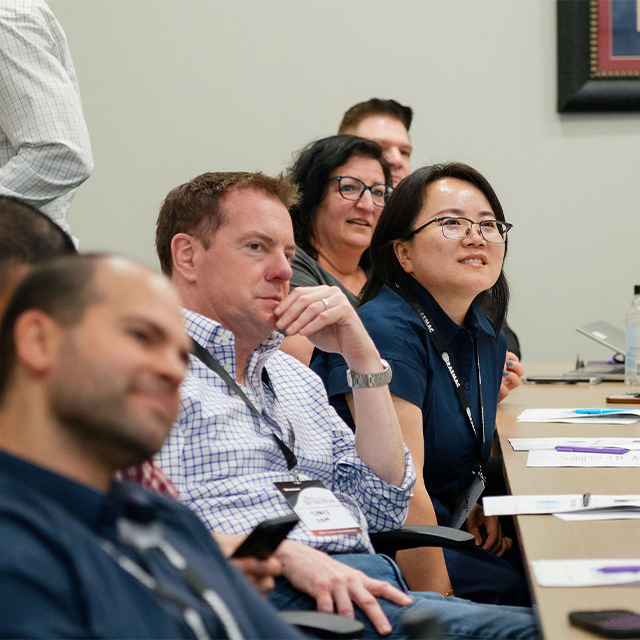 Executive Education participants engaging in custom program