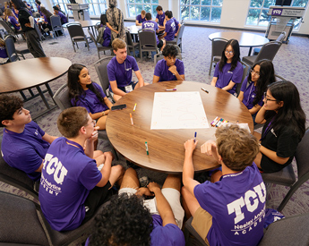 Neeley Analytics Academy pre-college students working together