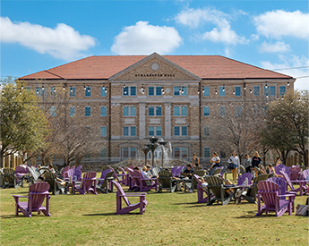 Students studying and talking in the TCU campus commons