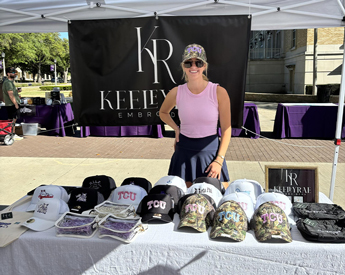 TCU student showcasing her products at Shaddock Market