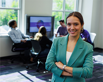 TCU Neeley student posing in classroom after giving business presentation