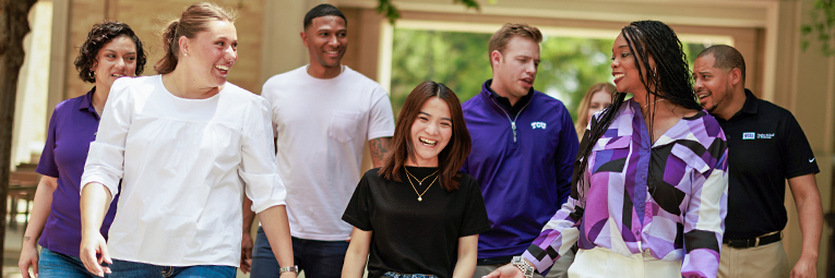 Students and faculty walking through campus