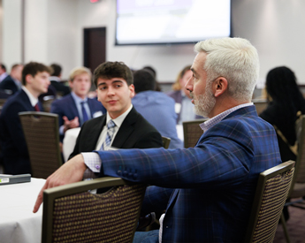 Mentor and student at event
