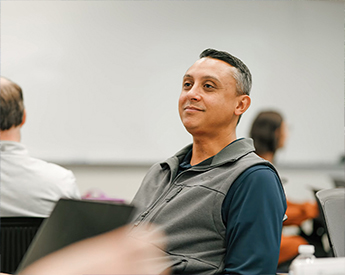 TCU Neeley Executive Education participant having conversation during session