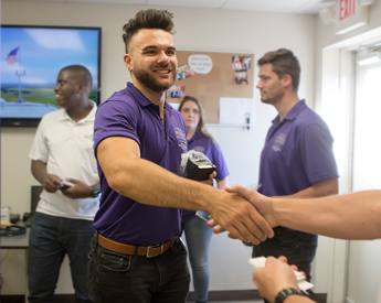 Energy Institute student networking on an energy facility tour