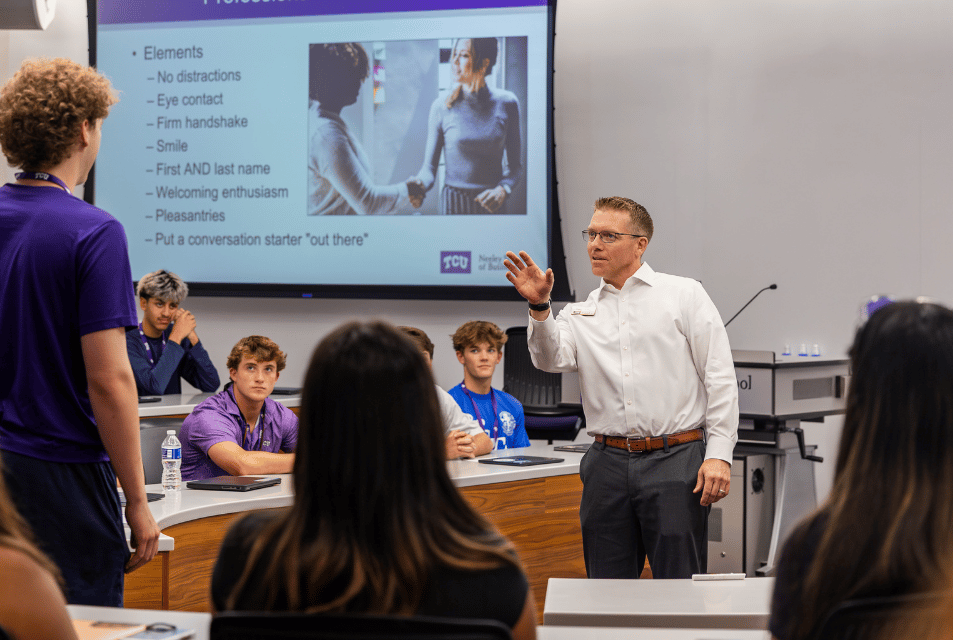 Associate Director for the Professional Development Center teaches new students in Neeley. 