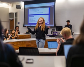 TCU Neeley student presenting to peers