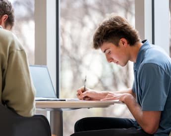 Business minor student working on computer