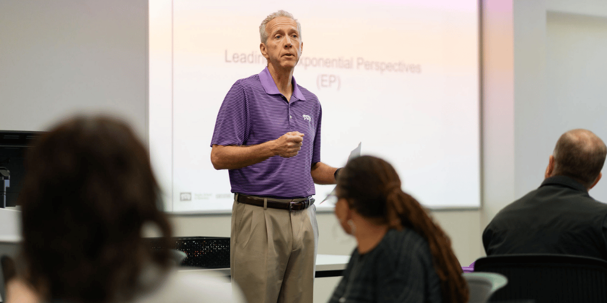 Jim Roach, the executive director for the TCU Neeley Executive Education program teaches a class. 