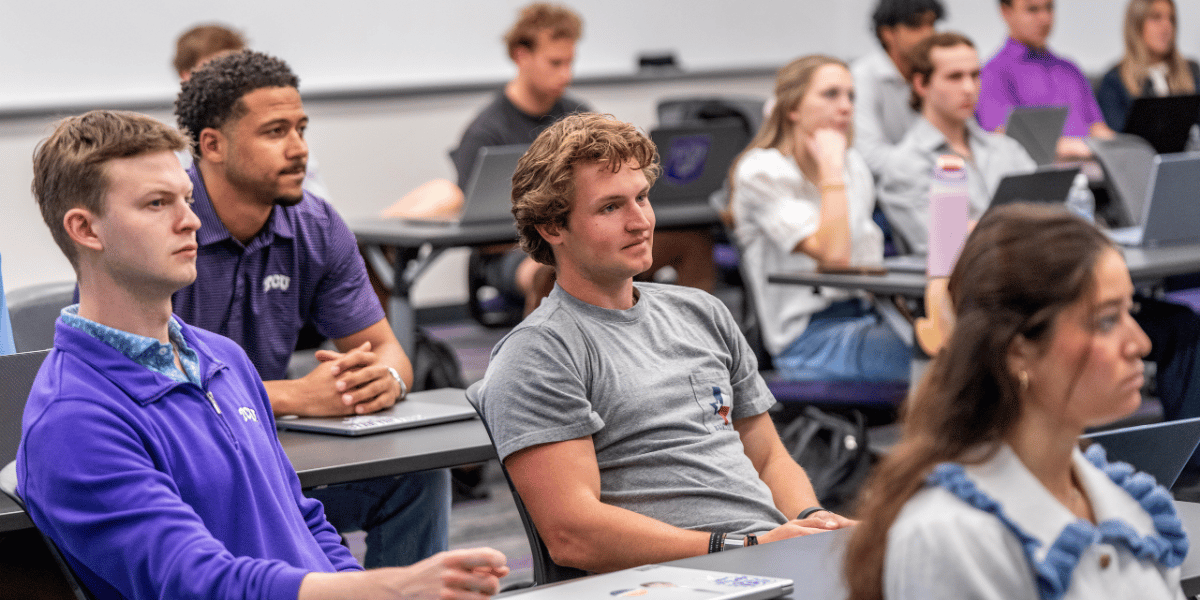 Undergraduate students pay close attention in class. 