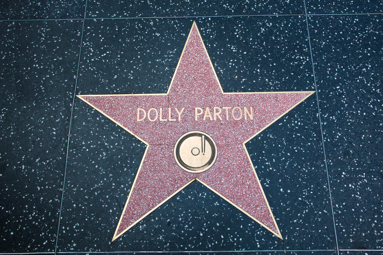 Dolly Parton's name is displayed on a star on the Hollywood Walk of Fame.